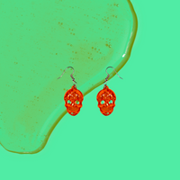 Orange Skulls - Unicorn Fart Productions