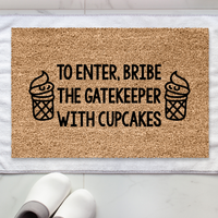 Thumbnail for Bribe the Gatekeeper Cupcakes Doormat - Unicorn Fart Productions