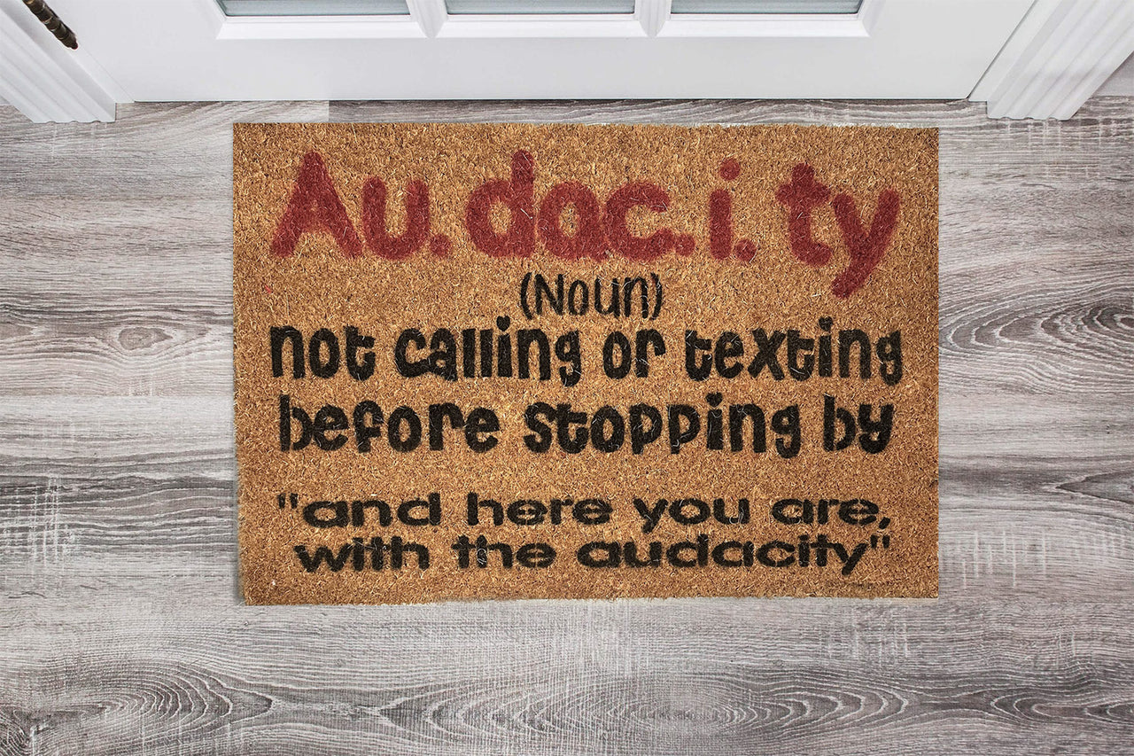 Door Mat - Au.dac.i.ty (noun) Not calling or texting before stopping by - Red